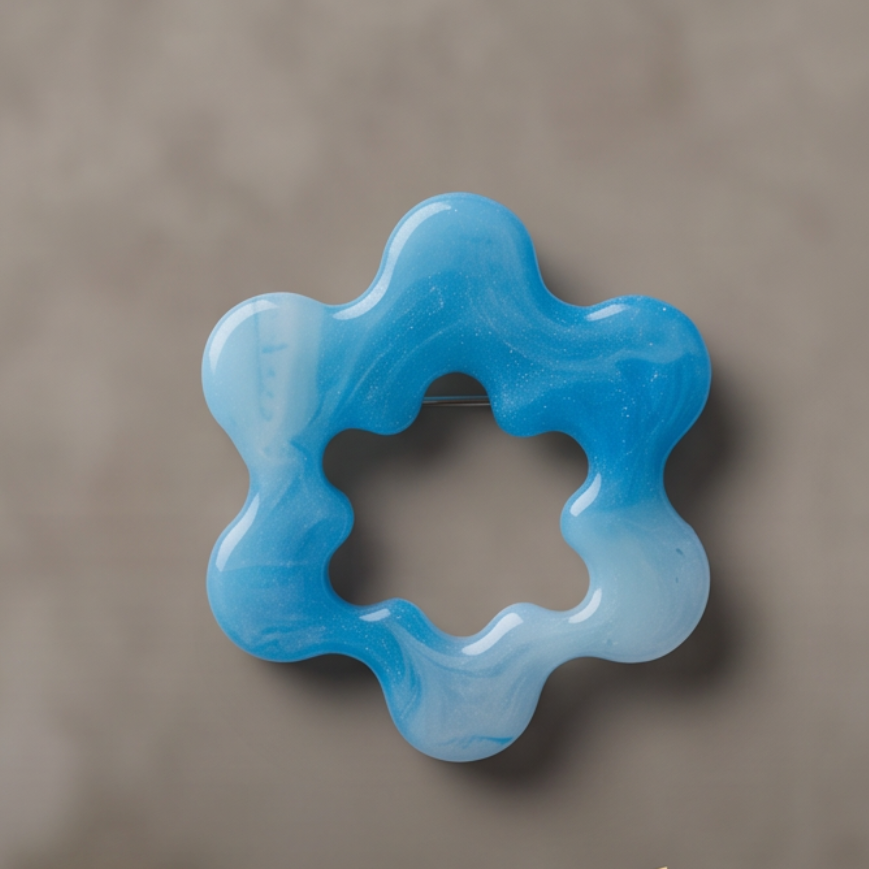 Broche pour lunettes artisanal en argile polymère et résine UV