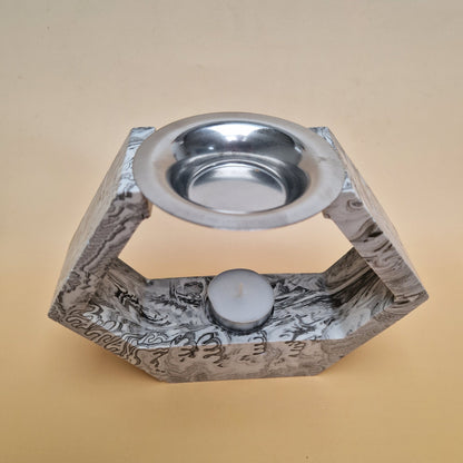 Queimador de essências preto e branco em Jesmonite com design hexagonal